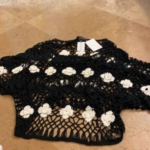 Black crochet sweater with white flowers